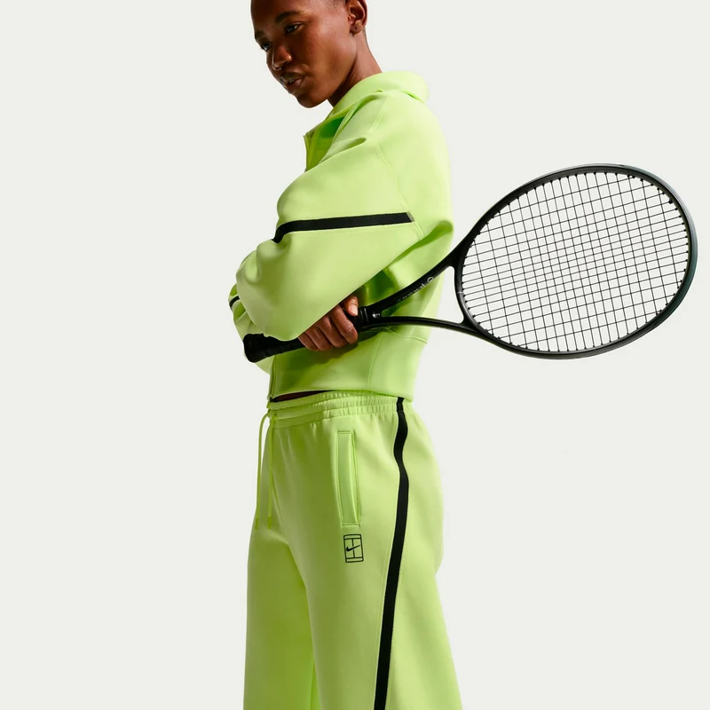 Court Dri-Fit Advantage Trainingshose Damen-limette