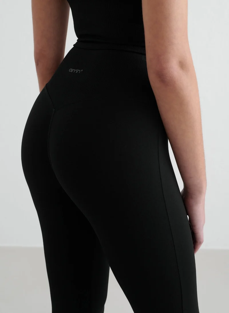Black Shape Seamless Flare Tights & Cross Back Bralette Set