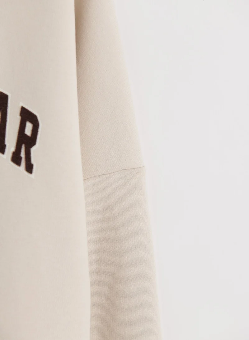 Sand Varsity Sweatshirt