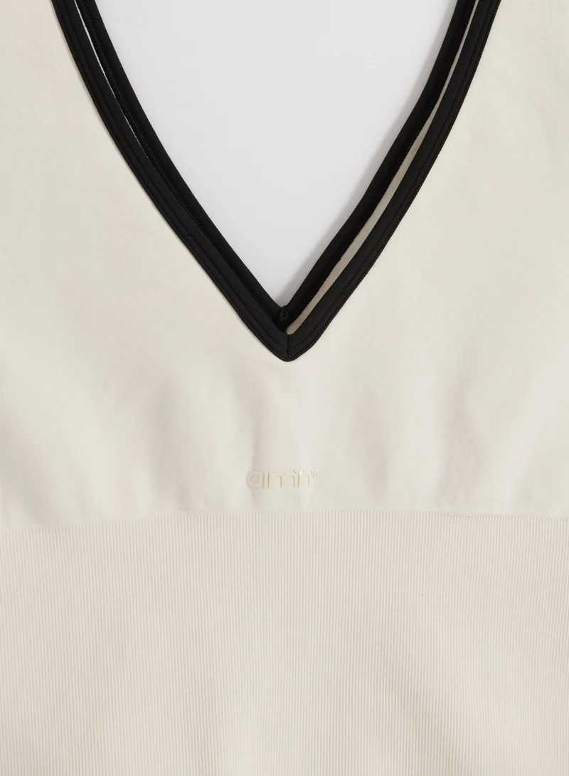 Cream Black Shape Seamless Deep Cut Singlet