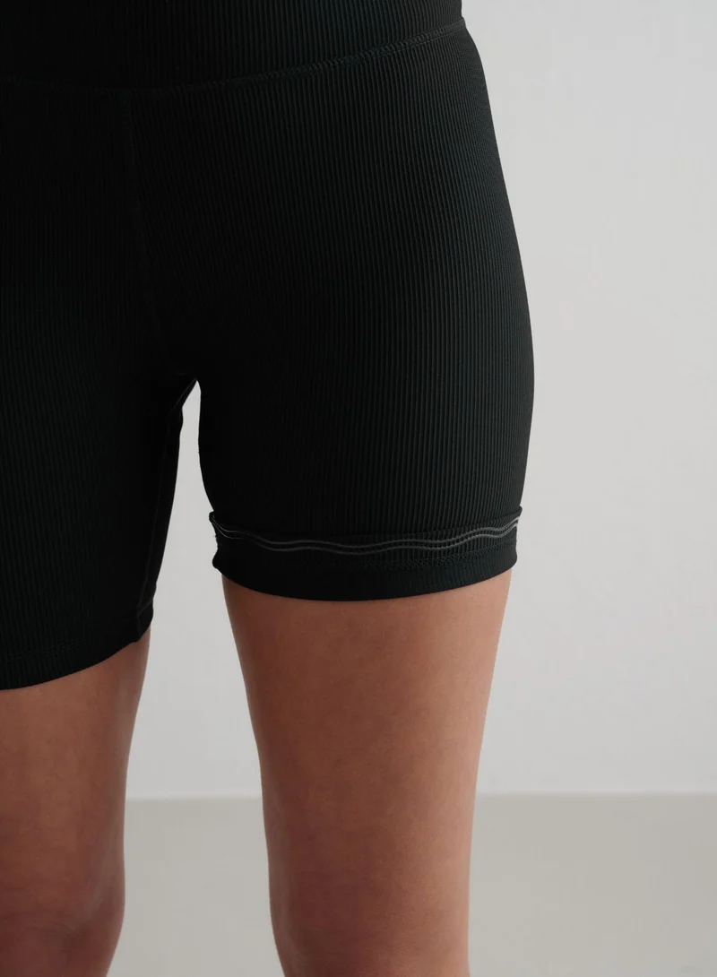 Black Ribbed Performance Midi Biker Shorts