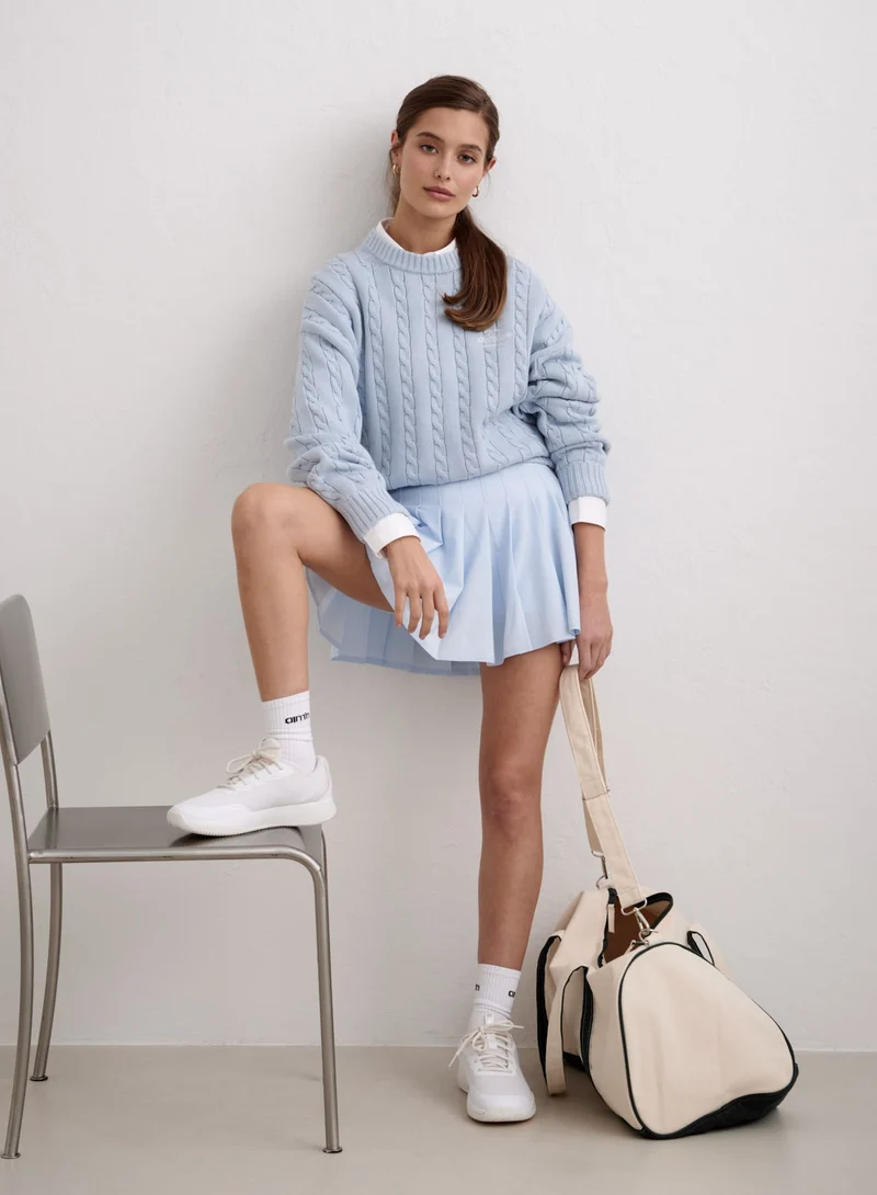 Aura Club Cable Knit Sweater