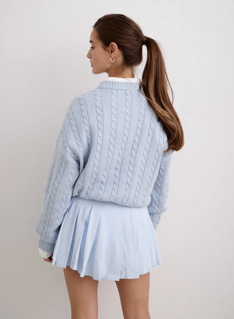 Aura Club Cable Knit Sweater