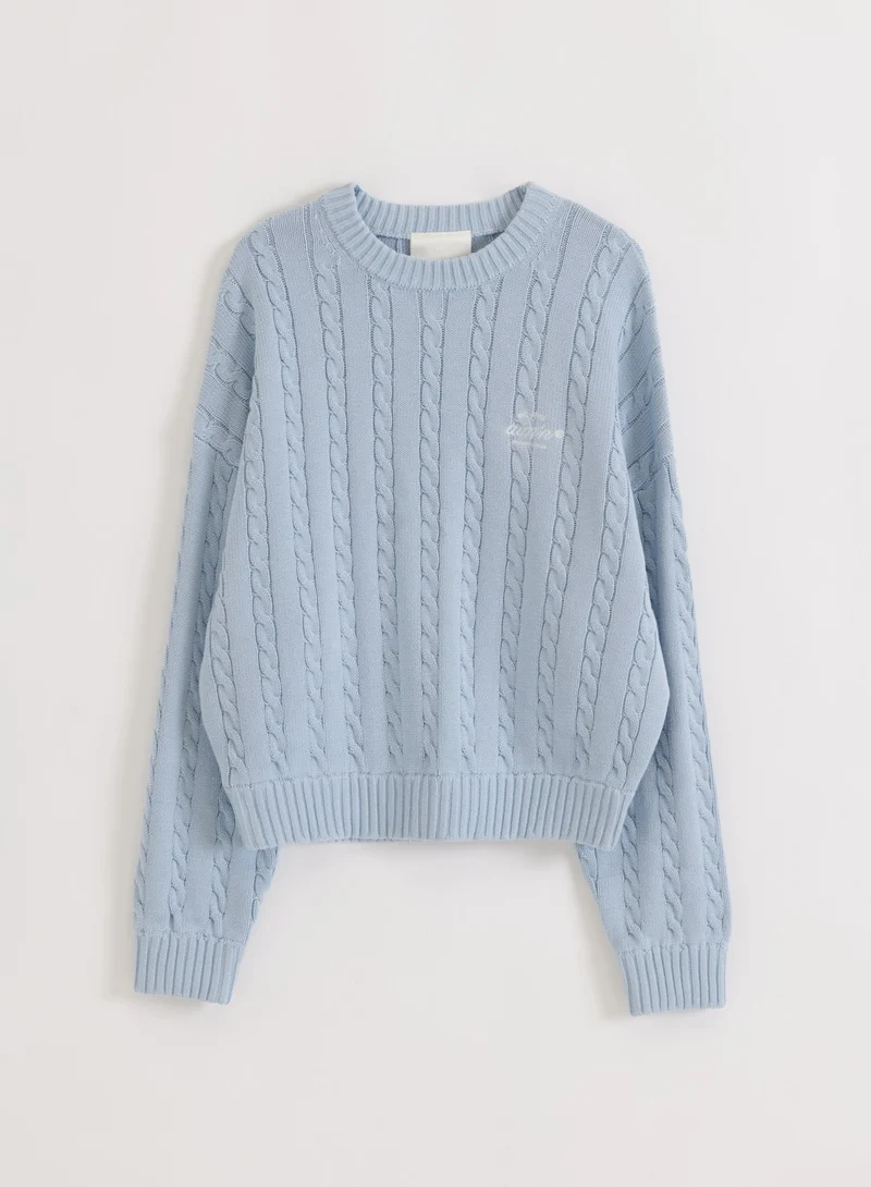 Aura Club Cable Knit Sweater