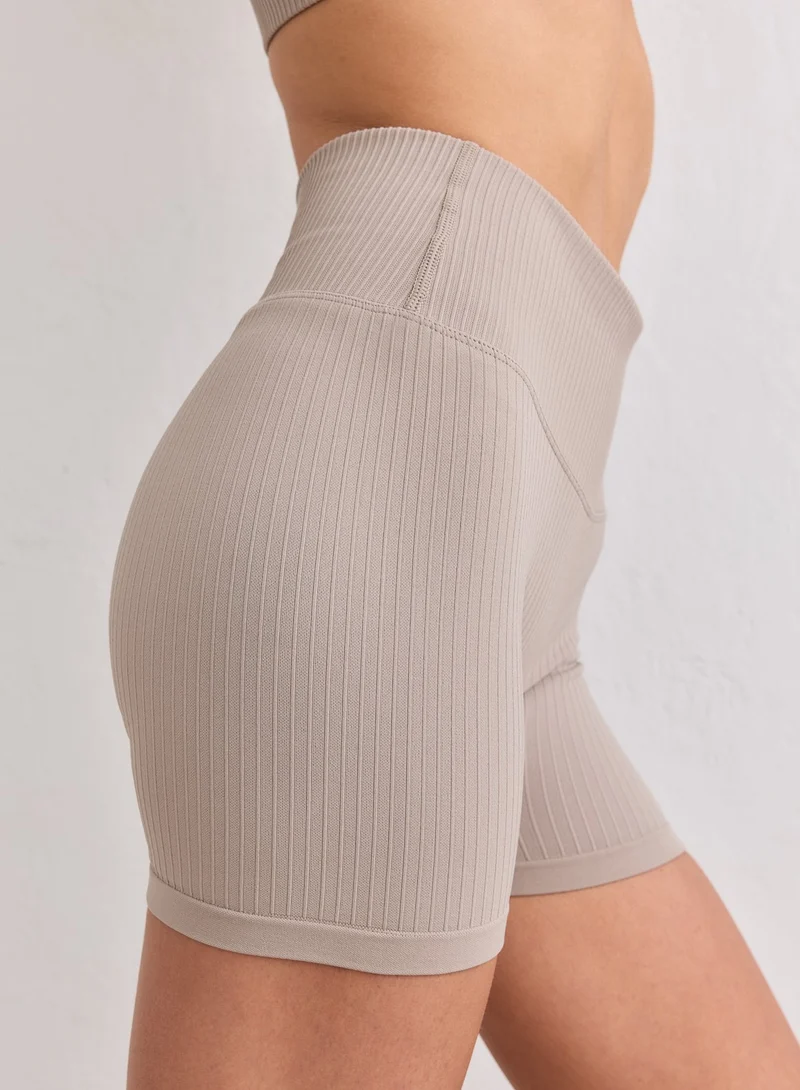 Dark Clay Ribbed Seamless Midi Biker Shorts
