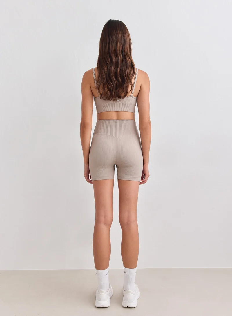 Dark Clay Ribbed Seamless Midi Biker Shorts